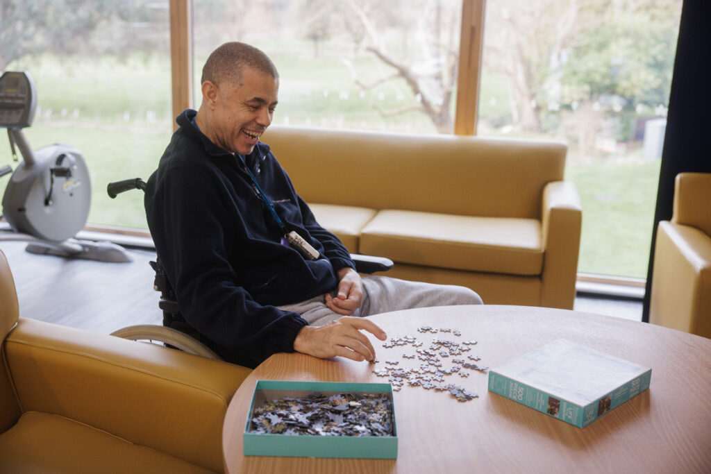 Rocky working on a jigsaw puzzle